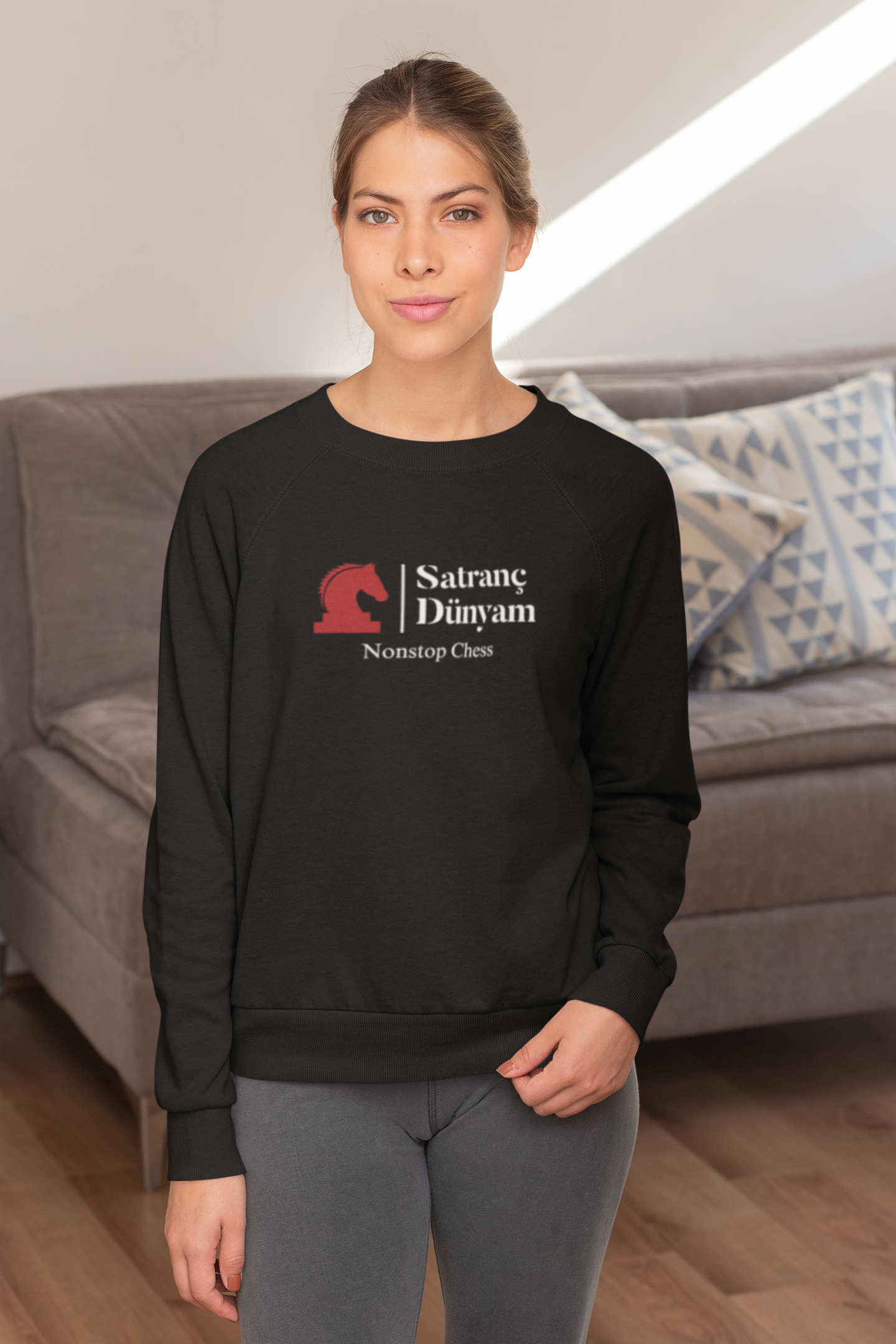 sublimated-sweatshirt-mockup-featuring-a-woman-against-a-sofa-31255 Satranç Temalı Kadın Sweatshirt – 4 Farklı Tasarım - Görsel 1